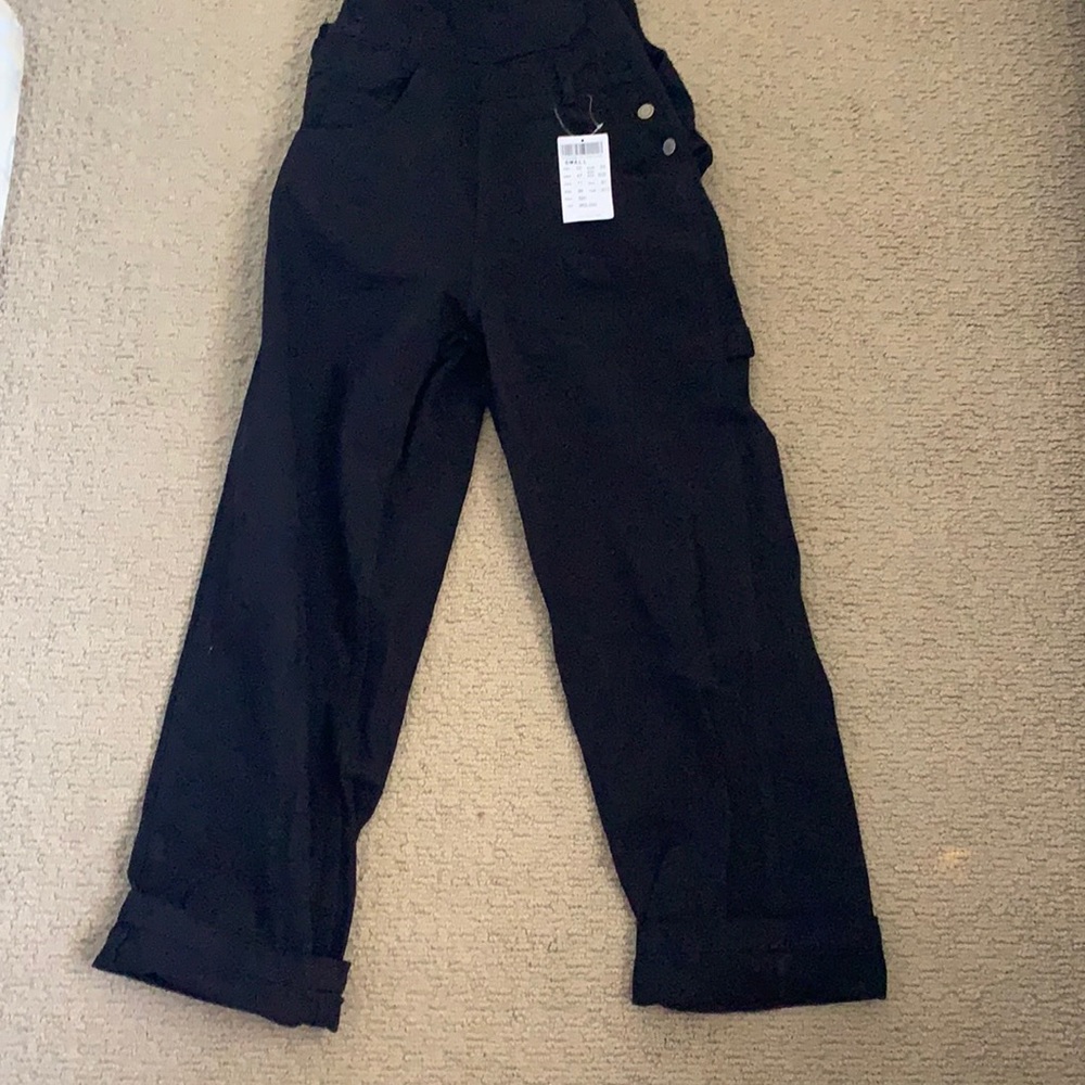 black denim jumpsuit.